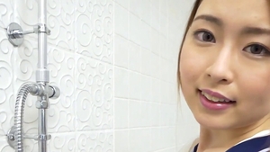 Wet japanese girl teasing in bath