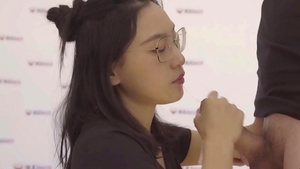 Japanese teen chick June Liu wearing heels footjob